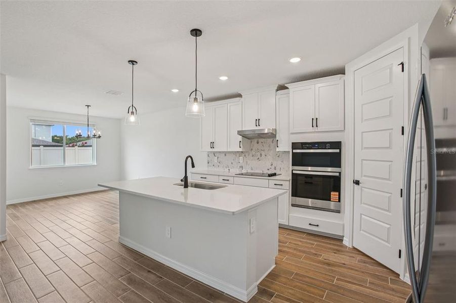 Furnished interior view inside a new home in Two Rivers - Signature Series, Zephyrhills (Image 4).