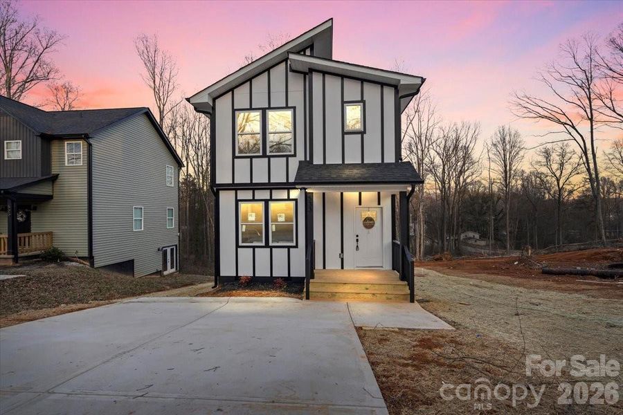 Front exterior of a new home in , Statesville, NC, highlighting curb appeal (Image 1). Front exterior of a new home in , Statesville, NC, highlighting curb appeal (Image 1).