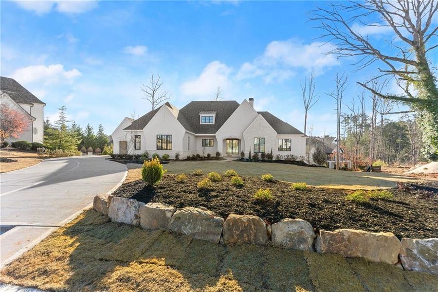 Front exterior of a new home in , Alpharetta, GA, highlighting curb appeal (Image 19).