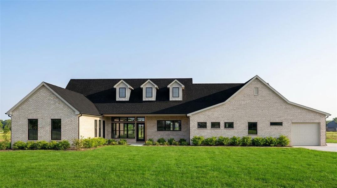 Front exterior of a new home in , Farmersville, TX, highlighting curb appeal (Image 11).