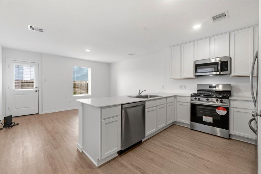 Furnished interior view inside a new home in Tavola, New Caney (Image 12).