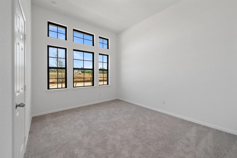Spacious, unfurnished interior of a new home in Spring Creek Trails, Magnolia (Image 12).