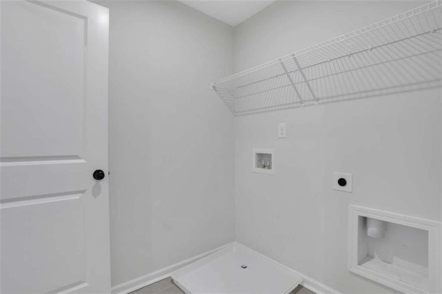 Spacious, unfurnished interior of a new home in The Paddocks at Doc Hughes, Buford (Image 34).