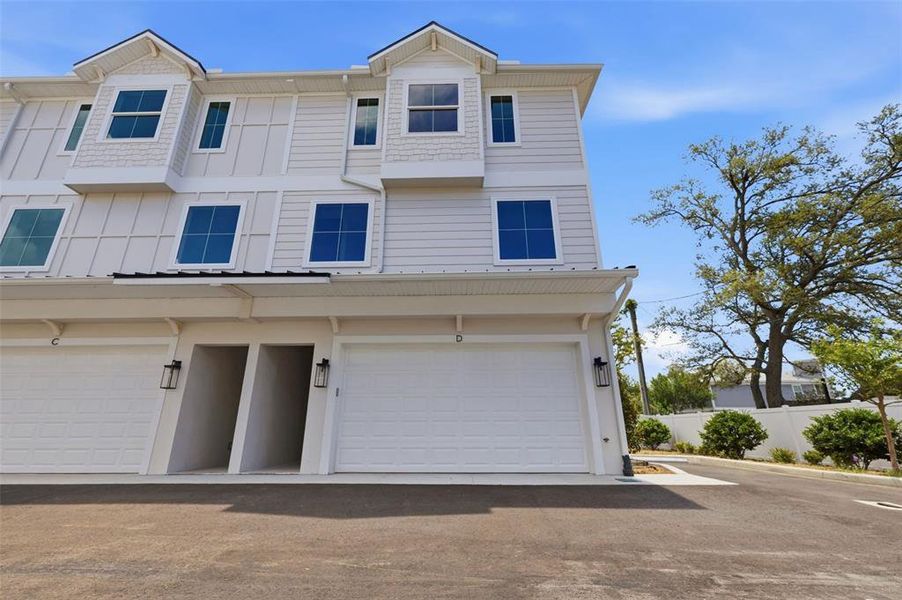 Front exterior of a new home in , Tampa, FL, highlighting curb appeal (Image 2). Front exterior of a new home in , Tampa, FL, highlighting curb appeal (Image 2).