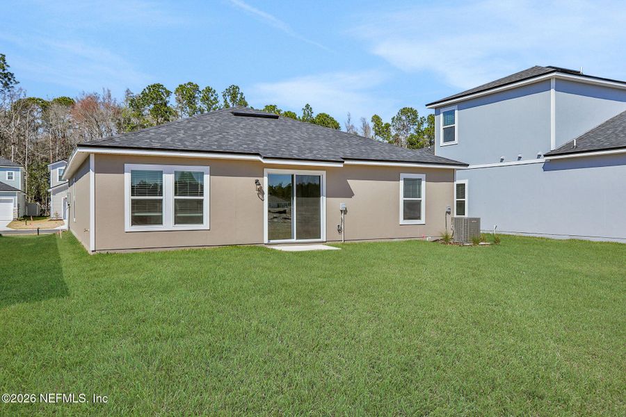 Exterior details and patio area of a home in Bellbrooke, Jacksonville (Image 22).