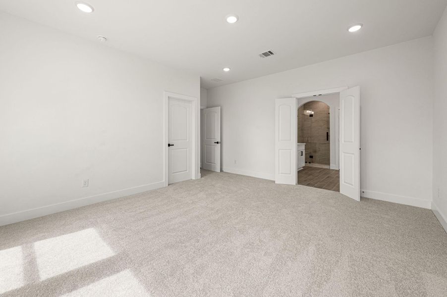 Master bedroom #3 with en-suite bathroom.
