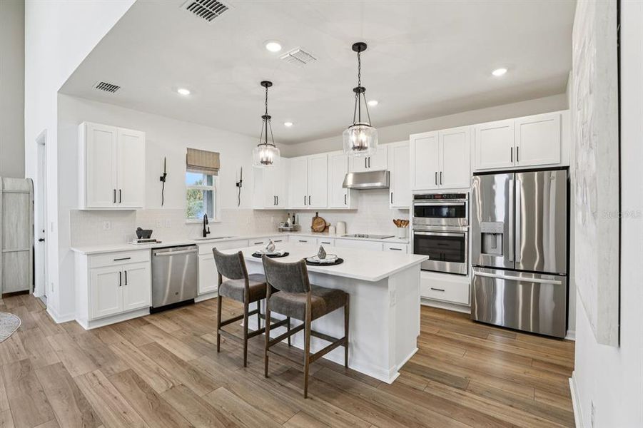 Furnished interior view inside a new home in Hawks Run, Kissimmee (Image 41).