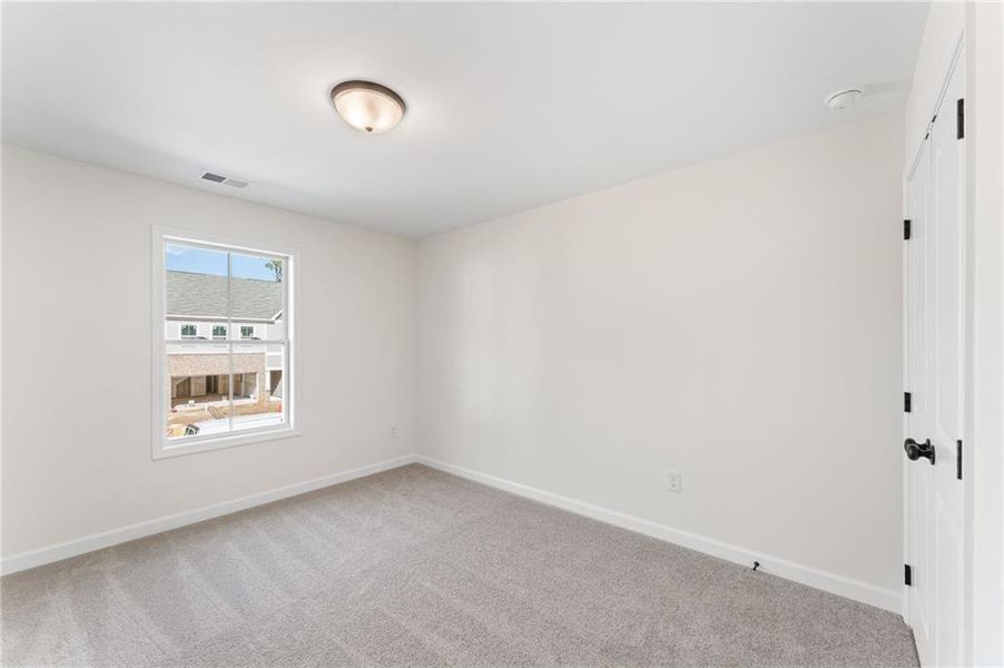 Spacious, unfurnished interior of a new home in River Walk Place, Lawrenceville (Image 14).