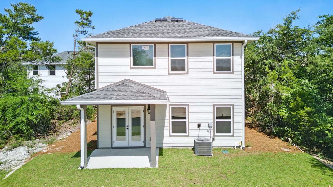 Exterior details and patio area of a home in Sanctuary Beach, Panama City Beach (Image 3).