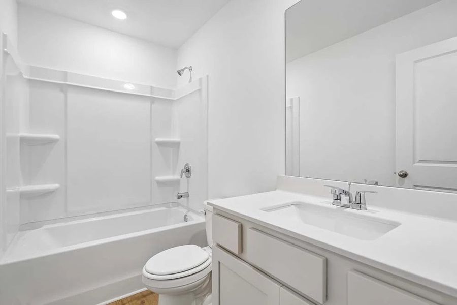 Representative Photo: Bathroom Two featuring Serene Collection Finishes