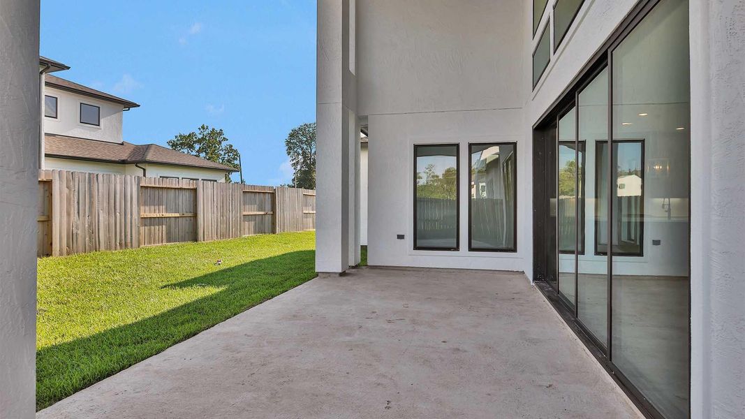 Front exterior of a new home in Sienna 65' - Valencia, Missouri City, TX, highlighting curb appeal (Image 12).