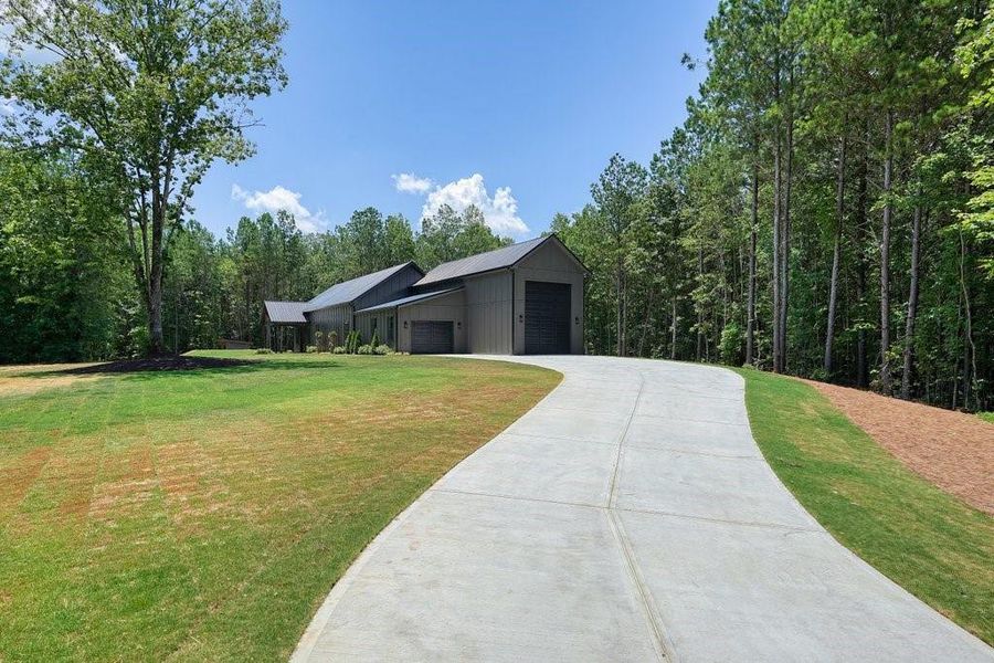 Front exterior of a new home in , Talking Rock, GA, highlighting curb appeal (Image 32). Front exterior of a new home in , Talking Rock, GA, highlighting curb appeal (Image 32).