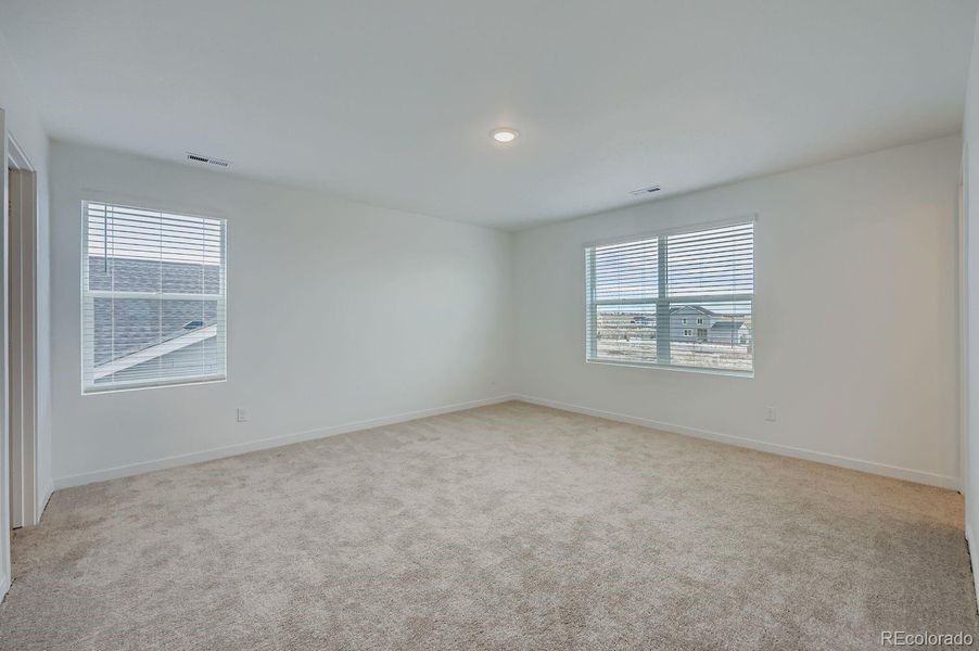 Spacious, unfurnished interior of a new home in Percheron: The Camden Collection, Colorado Springs (Image 7).