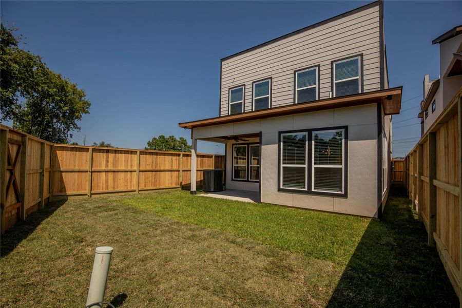 Front exterior of a new home in , Houston, TX, highlighting curb appeal (Image 22).