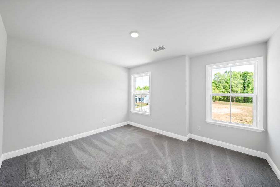 Spacious, unfurnished interior of a new home in Monroe Preserve, Chapin (Image 32).