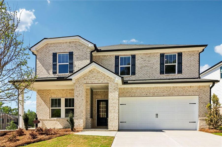 Front exterior of a new home in Harmony Manor, Fairburn, GA, highlighting curb appeal (Image 28). Front exterior of a new home in Harmony Manor, Fairburn, GA, highlighting curb appeal (Image 28).