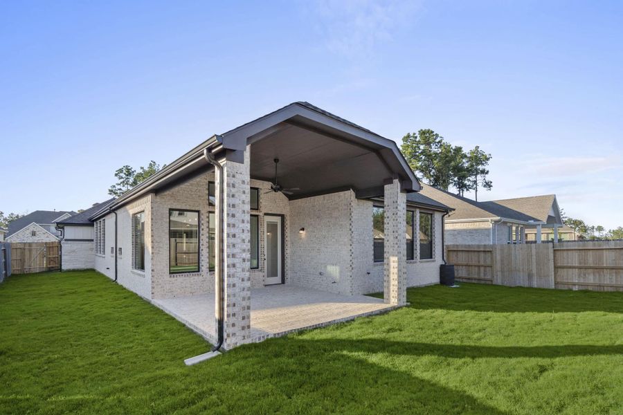Exterior details and patio area of a home in Artavia, Conroe (Image 19). Exterior details and patio area of a home in Artavia, Conroe (Image 19).