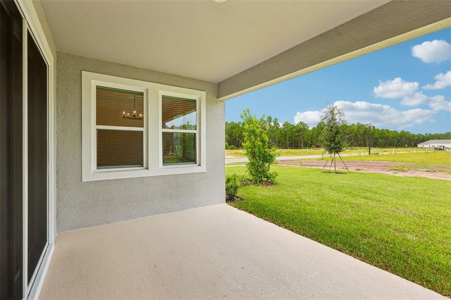 Exterior details and patio area of a home in , Ormond Beach (Image 24).