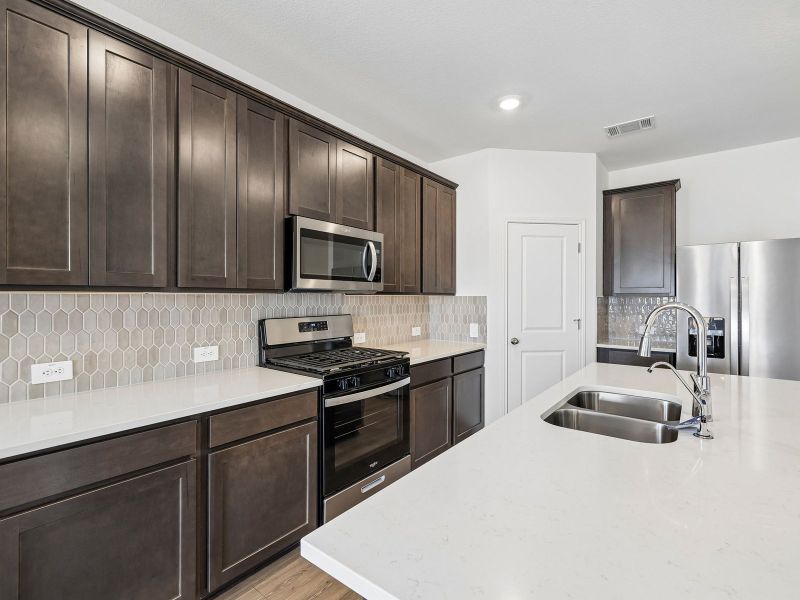 Furnished interior view inside a new home in Waterstone Crossing, Kyle (Image 4).