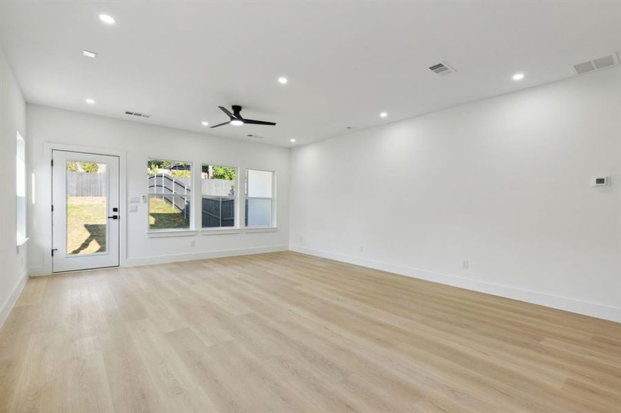 Spare room featuring light hardwood / wood-style flooring and ceiling fan