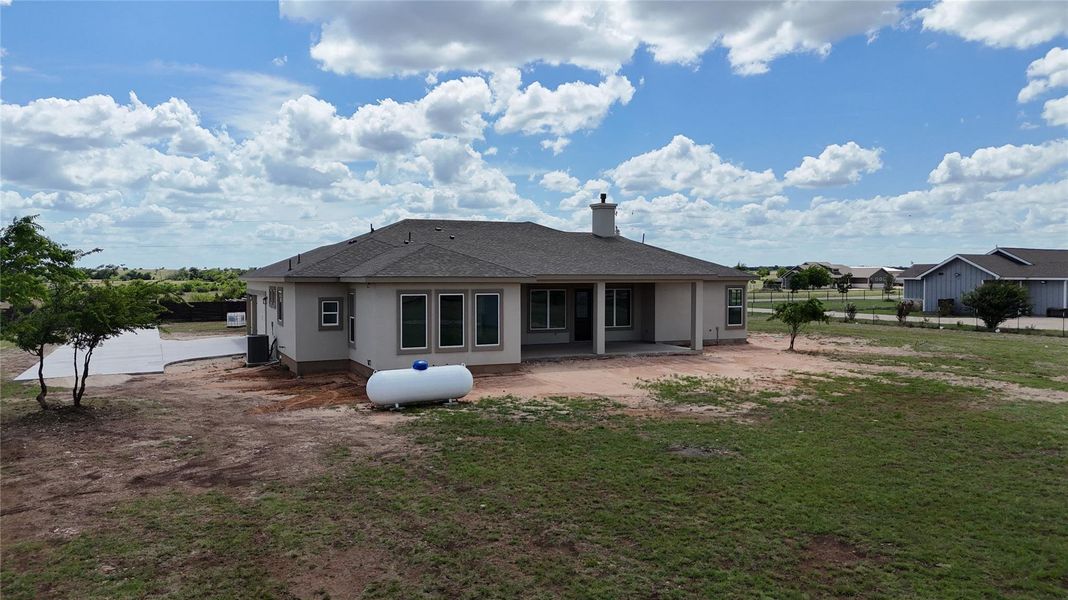 Exterior details and patio area of a home in , Bertram (Image 26).