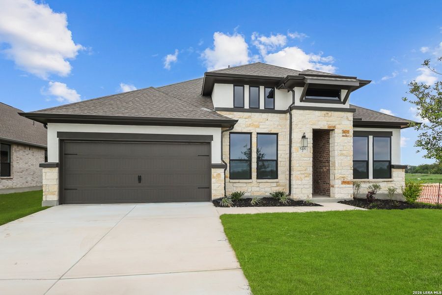 Front exterior of a new home in Buffalo Crossing, Cibolo, TX, highlighting curb appeal (Image 28).