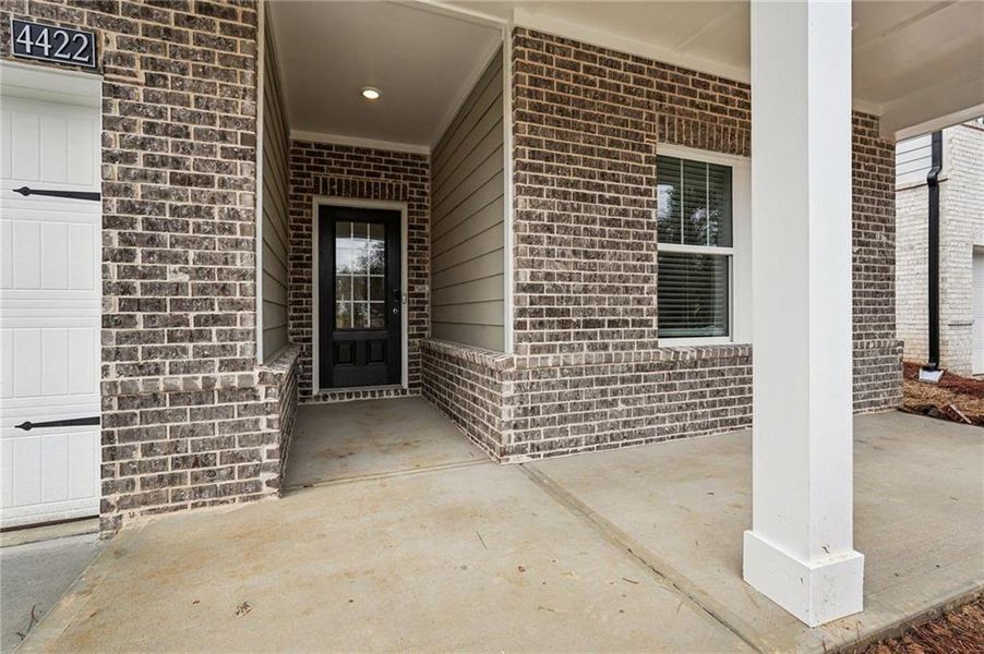 Exterior details and patio area of a home in Westmont Preserve, Powder Springs (Image 4). Exterior details and patio area of a home in Westmont Preserve, Powder Springs (Image 4).
