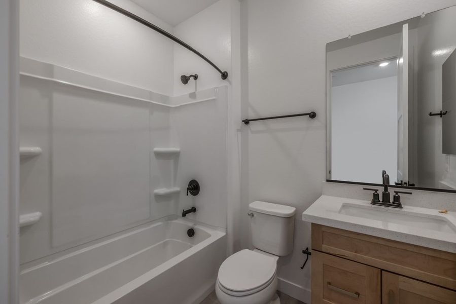 Representative furnished interior of a home built from the Ponderosa by William Ryan Homes in Silver Cross, San Tan Valley (Image 39).
