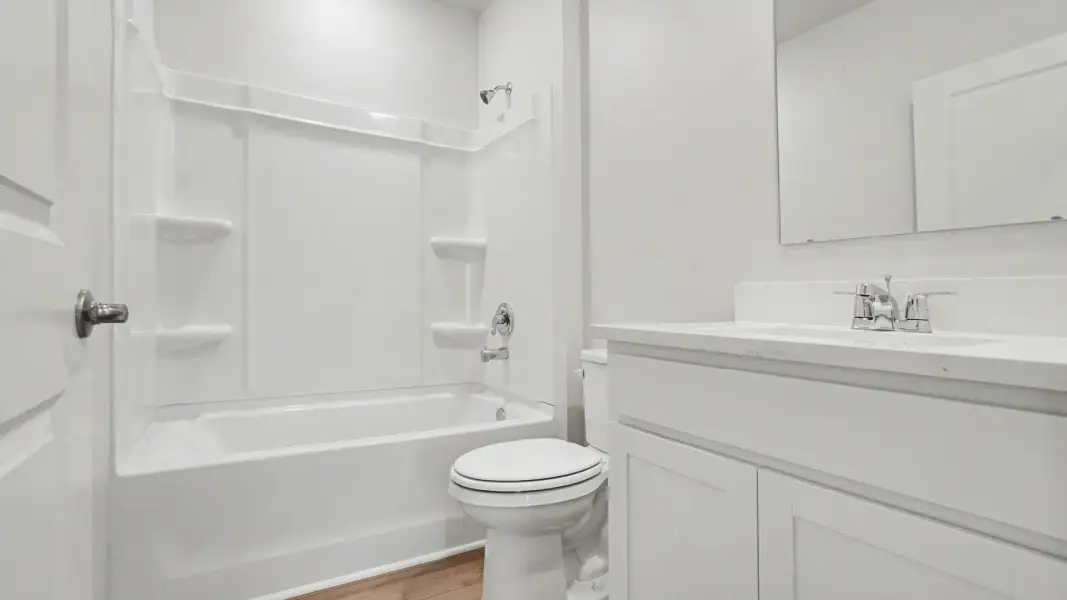 Furnished interior view inside a new home in Venetian Grove, Vero Beach (Image 9).