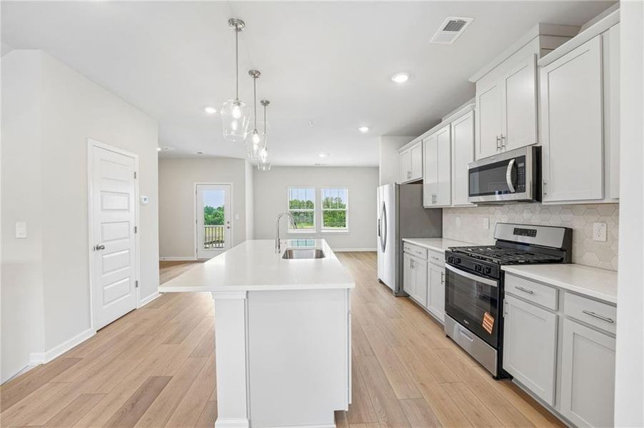 Furnished interior view inside a new home in Hemingway - Highland Series, Cumming (Image 10).
