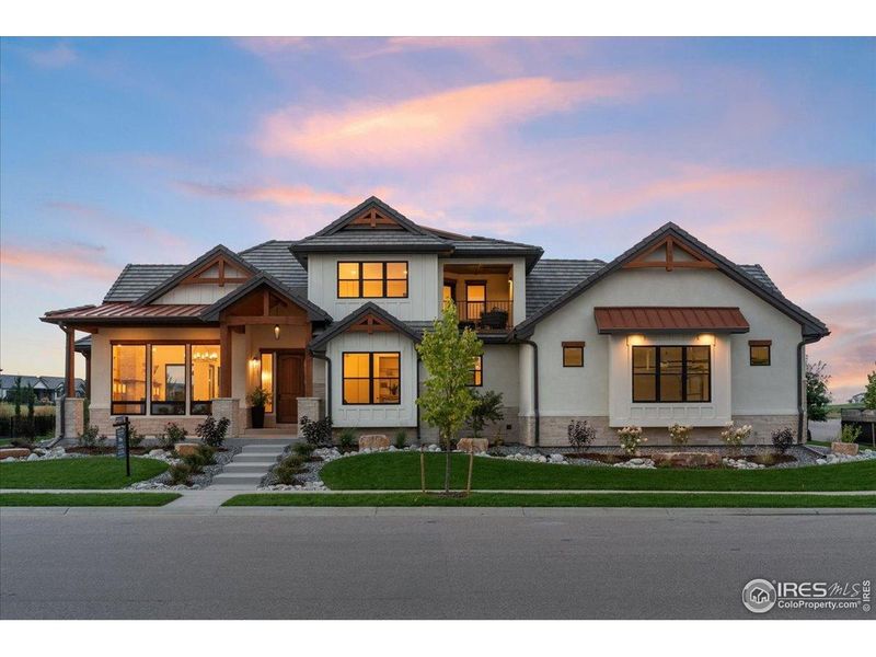 Front exterior of a new home in , Berthoud, CO, highlighting curb appeal (Image 2).
