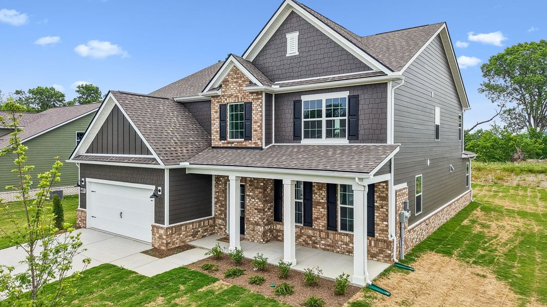 Front exterior of a new home in Pottsview, Smyrna, TN, highlighting curb appeal (Image 1). Front exterior of a new home in Pottsview, Smyrna, TN, highlighting curb appeal (Image 1).