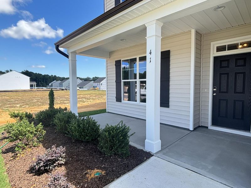 Exterior details and patio area of a home in Daniel Farms, Benson (Image 3).