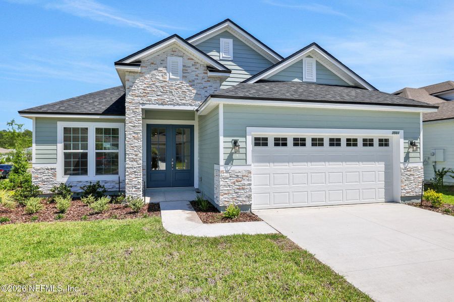 Front exterior of a new home in Hyland Trail, Green Cove Springs, FL, highlighting curb appeal (Image 25).