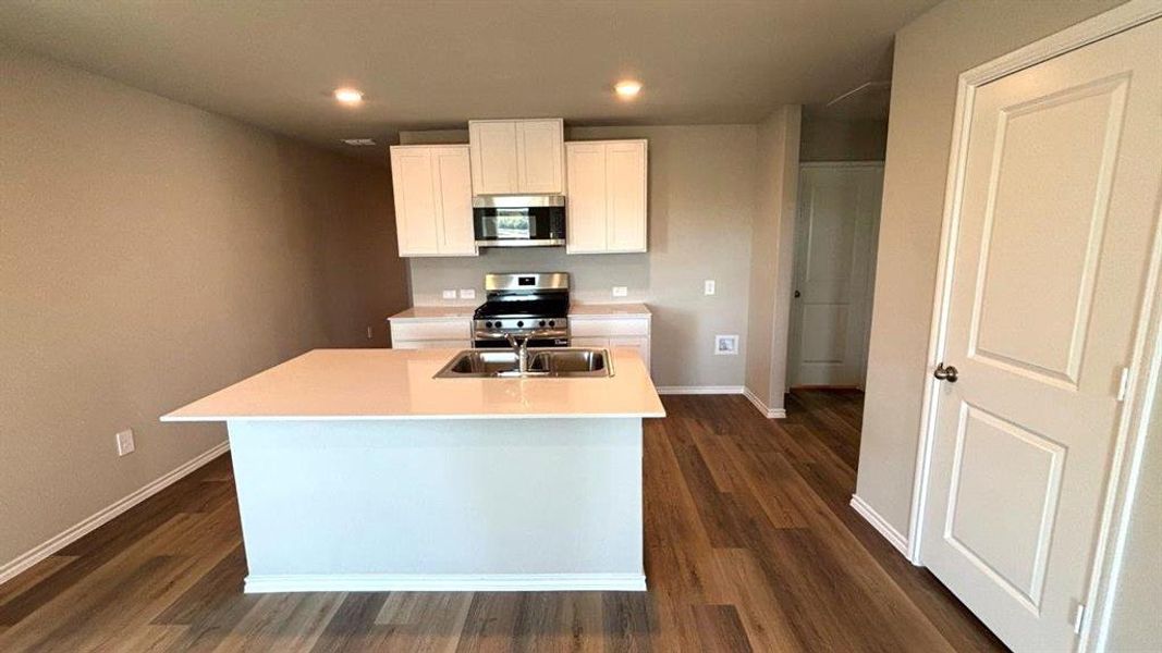 Kitchen-All Home and community information, including pricing, included features, terms, availability and amenities, are subject to change at any time without notice or obligation. All Drawings, pictures, photographs, video, square footages, floor plans, elevations, features, colors and sizes are approximate for illustration purposes only and will vary from the homes as built.
