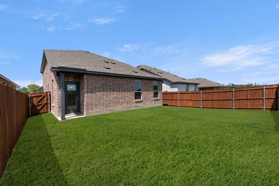 Front exterior of a new home in Churchill, Anna, TX, highlighting curb appeal (Image 28). Front exterior of a new home in Churchill, Anna, TX, highlighting curb appeal (Image 28).