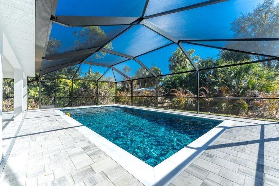 Exterior details and patio area of a home in , Port Charlotte (Image 28).