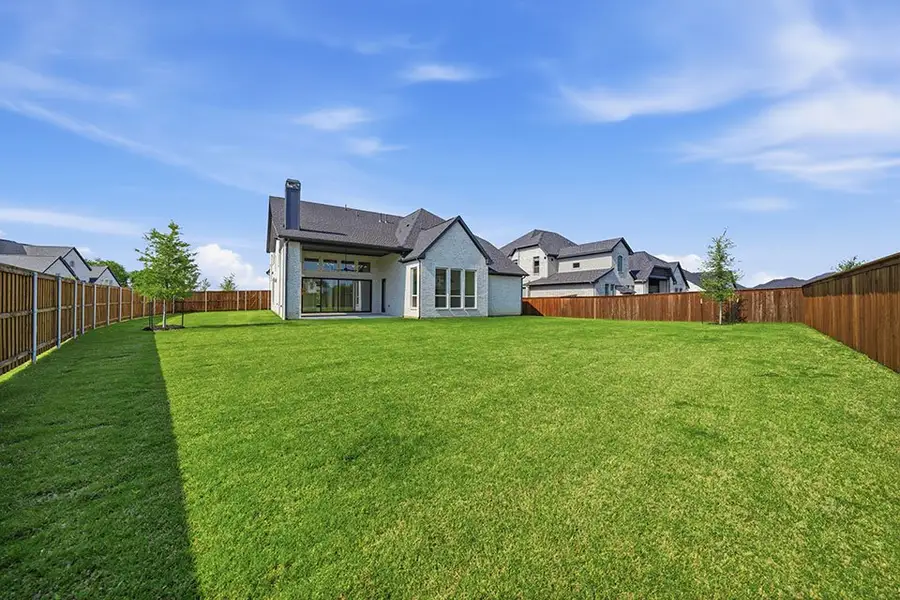 Exterior details and patio area of a home in Light Farms Graham/Reagan, Celina (Image 4).