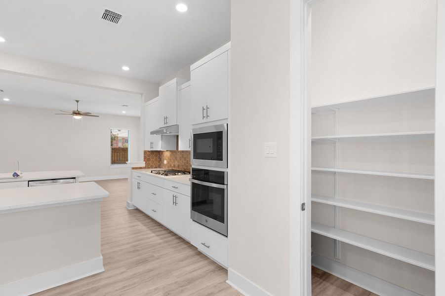 Furnished interior view inside a new home in Lariat, Liberty Hill (Image 18). Furnished interior view inside a new home in Lariat, Liberty Hill (Image 18).