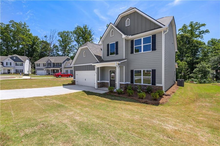 Front exterior of a new home in , Villa Rica, GA, highlighting curb appeal (Image 2).
