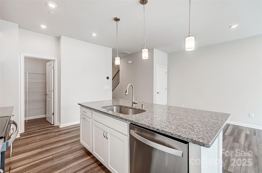 Kitchen Island with View of Walk-In Pantry-Photo Similar to Subject Property