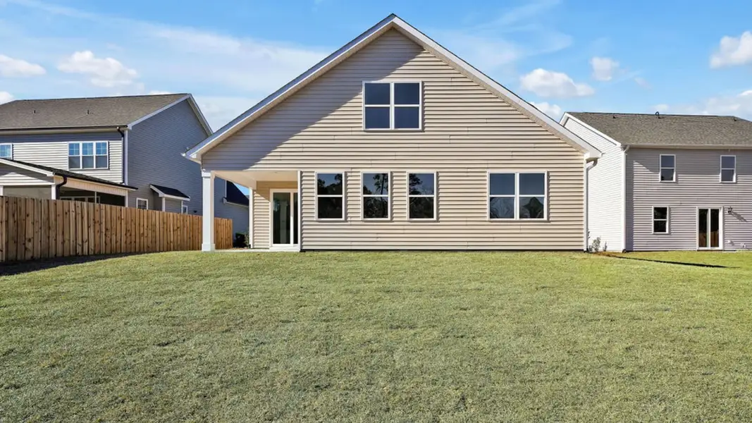 Exterior details and patio area of a home in Grayson Park, Leland (Image 3).