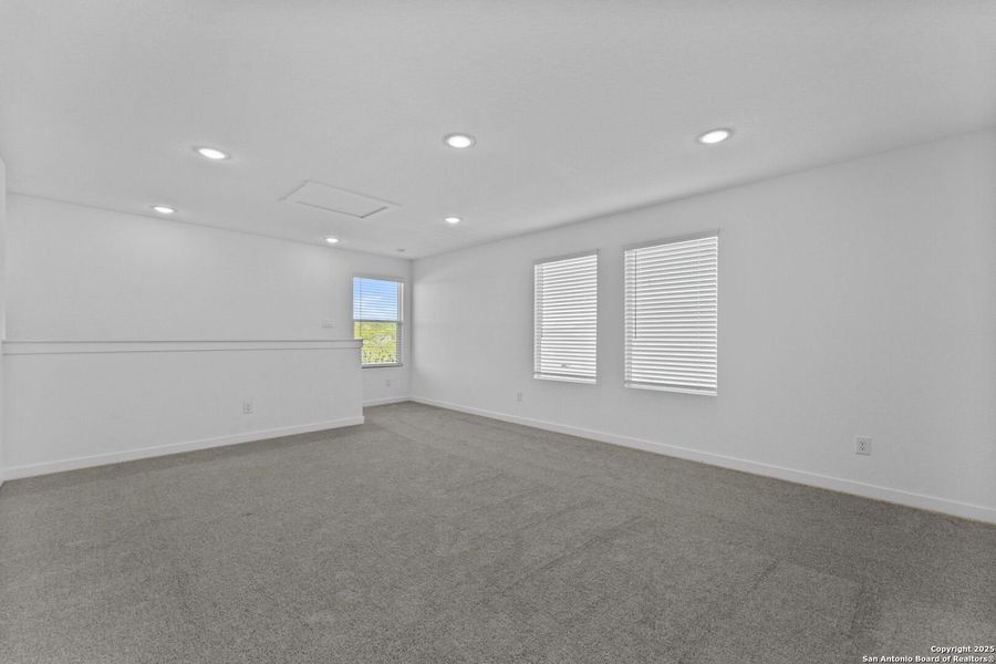 Spacious, unfurnished interior of a new home in Waterwheel: Coastline Collection, San Antonio (Image 19).