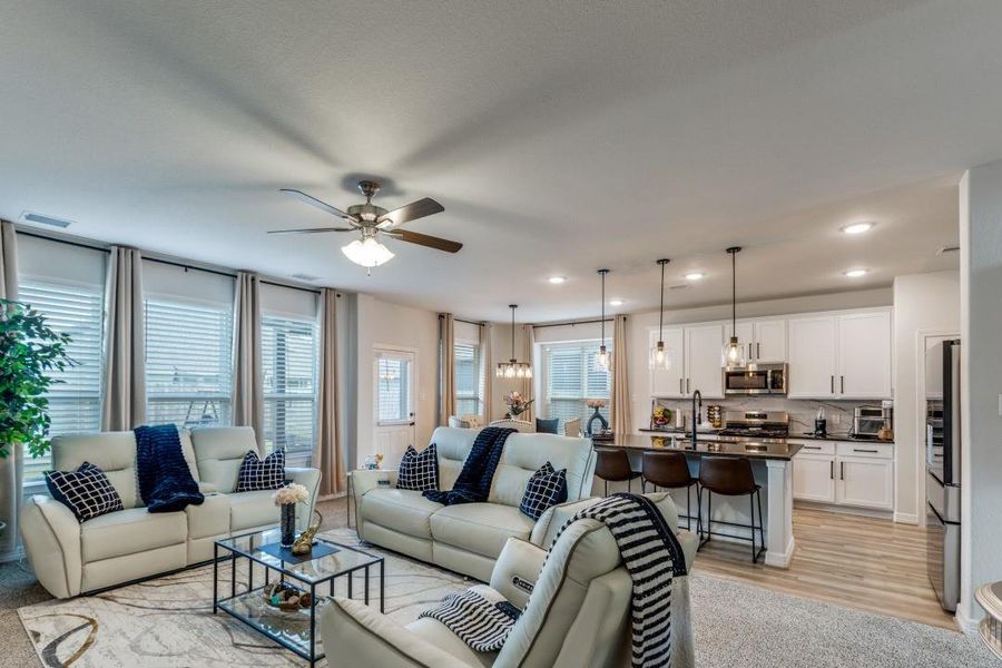 The open concept from kitchen to family room is a perfect blend for family gatherings and entertainment.