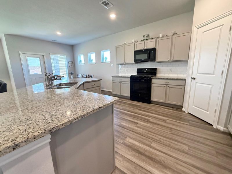 Furnished interior view inside a new home in , Angleton (Image 10).