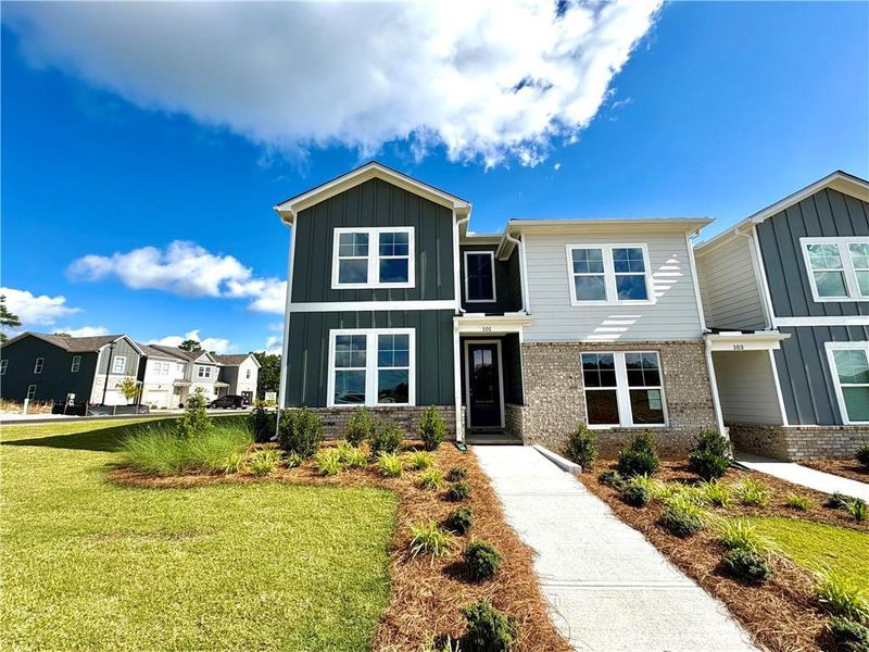 Front exterior of a new home in Stegall Village, Cartersville, GA, highlighting curb appeal (Image 5). Front exterior of a new home in Stegall Village, Cartersville, GA, highlighting curb appeal (Image 5).