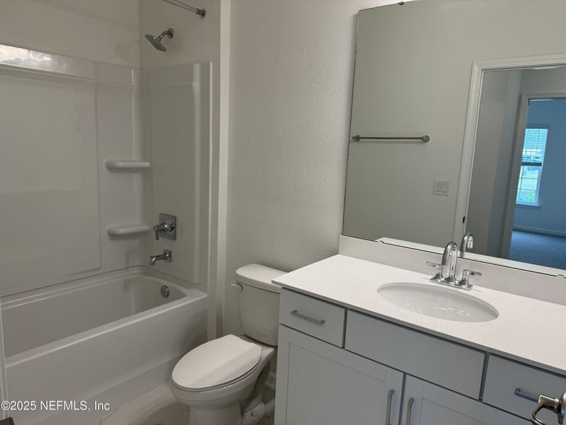 Furnished interior view inside a new home in Hyland Trail, Green Cove Springs (Image 10).