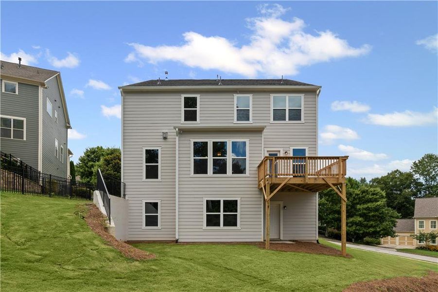 Front exterior of a new home in Reunion, Hoschton, GA, highlighting curb appeal (Image 2).