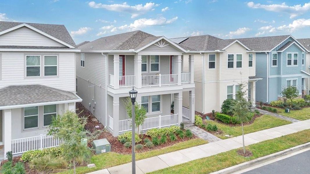 Front exterior of a new home in , Winter Garden, FL, highlighting curb appeal (Image 21).