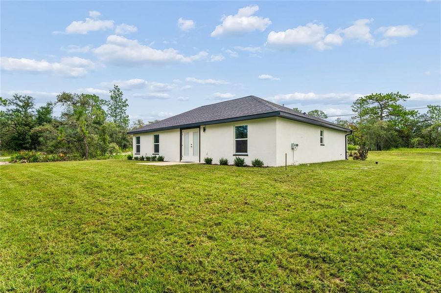 Exterior details and patio area of a home in , Brooksville (Image 34).